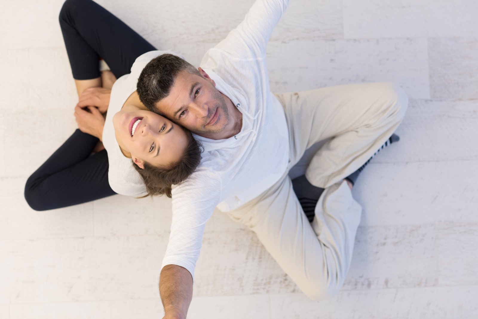 About 4 medium vecteezy couple sitting with back to each other on floor 10393293 medium 1