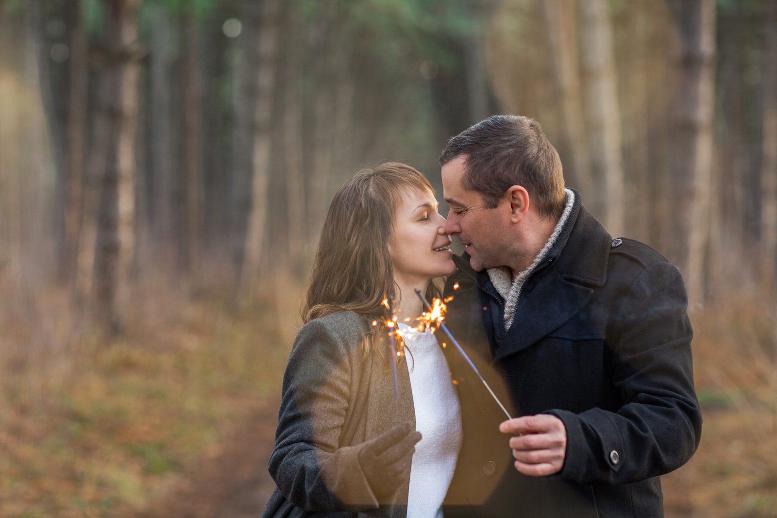 vecteezy happy couple hugging and kissing in winter park 48663813 scaled